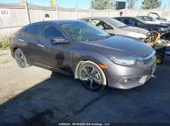 2HGFC1F90JH107934 2018 HONDA CIVIC