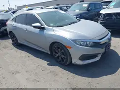 2HGFC2F59JH571596 2018 HONDA CIVIC