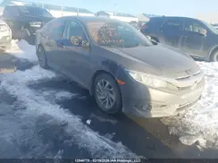 2HGFC2F64JH031372 2018 HONDA CIVIC