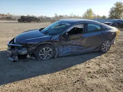 2HGFC2F64JH031596 2018 HONDA CIVIC
