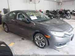 2HGFC2F64JH586869 2018 HONDA CIVIC