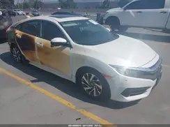 2HGFC2F72JH515551 2018 HONDA CIVIC