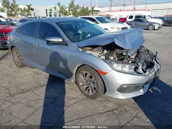 2HGFC2F77JH556385 2018 HONDA CIVIC