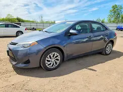 2T1BURHE8JC000871 2018 TOYOTA COROLLA
