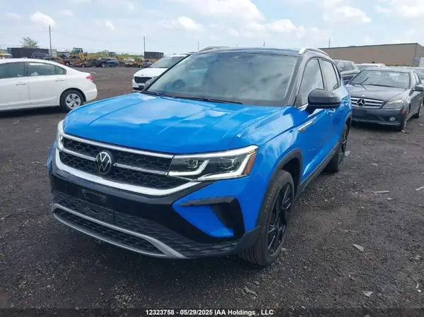 3VV4X7B22PM372291 2023 VOLKSWAGEN TAOS - Image 2