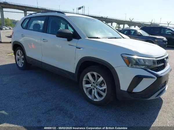 3VVAX7B21PM311615 2023 VOLKSWAGEN TAOS - Image 1