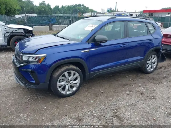 3VVAX7B27PM302756 2023 VOLKSWAGEN TAOS - Image 2