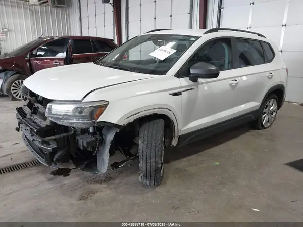 3VVAX7B29PM311491 2023 VOLKSWAGEN TAOS - Image 2