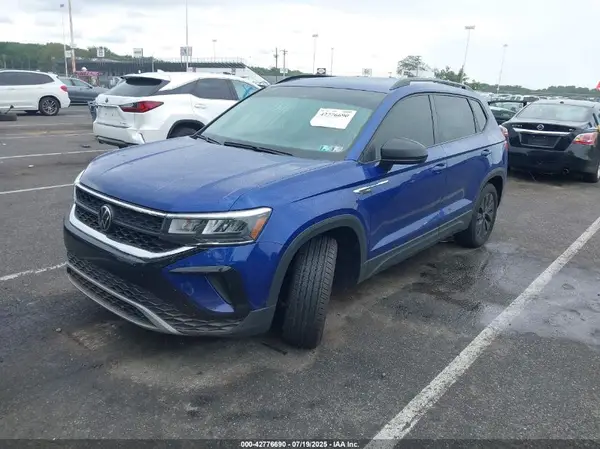 3VVCX7B27PM369933 2023 VOLKSWAGEN TAOS - Image 2
