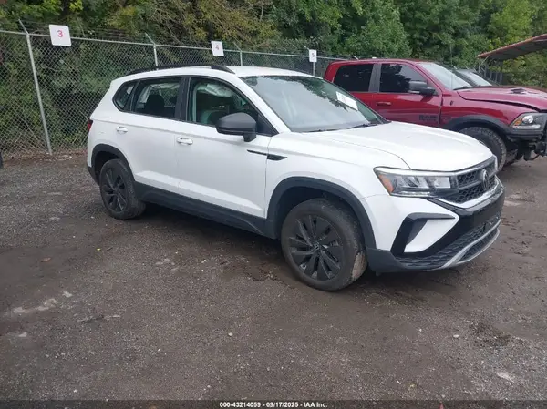 3VVDX7B23PM329840 2023 VOLKSWAGEN TAOS - Image 1