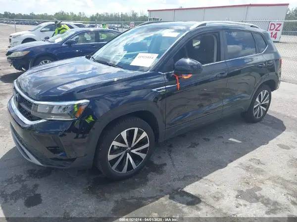 3VVEX7B27RM124612 2024 VOLKSWAGEN TAOS - Image 2