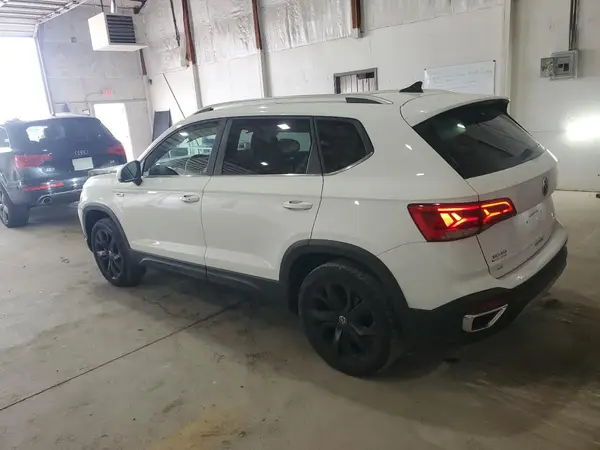 3VVEX7B28PM378102 2023 VOLKSWAGEN TAOS - Image 2