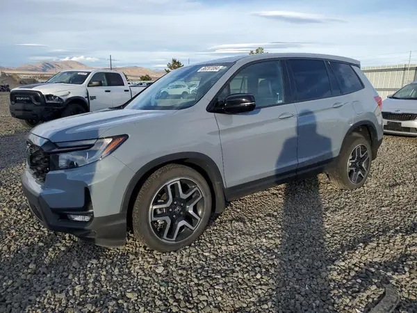 5FNYF8H09PB011546 2023 HONDA PASSPORT - Image 1