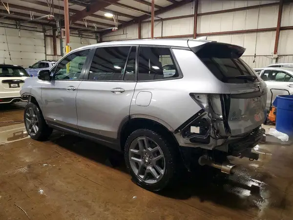 5FNYF8H52PB008676 2023 HONDA PASSPORT - Image 2