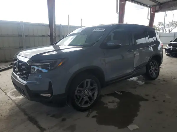 5FNYF8H52PB033710 2023 HONDA PASSPORT - Image 1