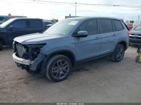 5FNYF8H53PB001042 2023 HONDA PASSPORT - Image 2