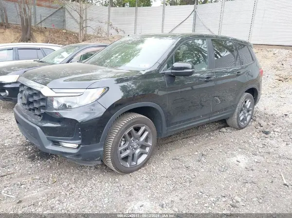 5FNYF8H53PB011859 2023 HONDA PASSPORT - Image 2
