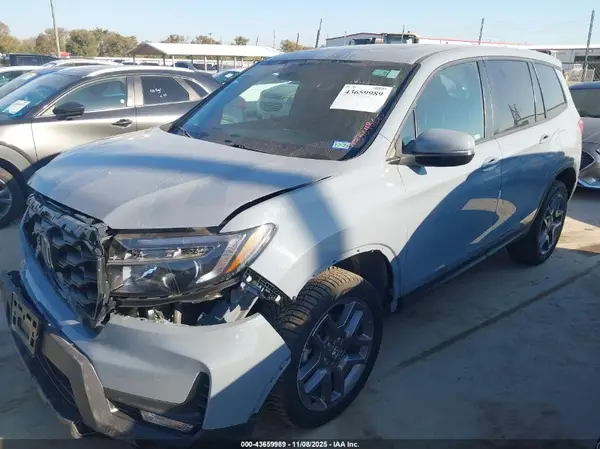 5FNYF8H56PB003707 2023 HONDA PASSPORT - Image 2