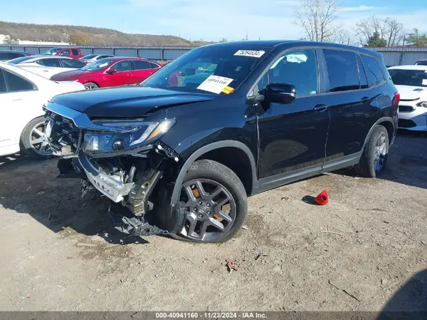 5FNYF8H59PB020467 2023 HONDA PASSPORT - Image 2