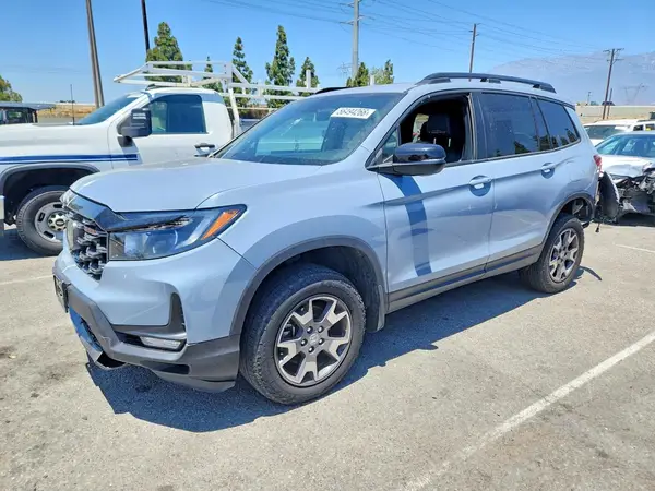 5FNYF8H61PB002957 2023 HONDA PASSPORT - Image 1