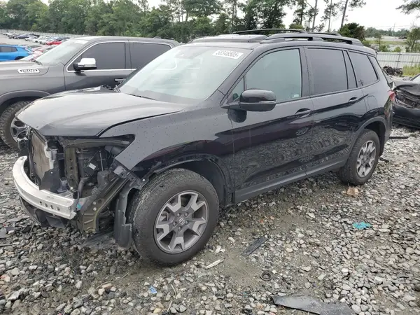 5FNYF8H65PB000869 2023 HONDA PASSPORT - Image 1