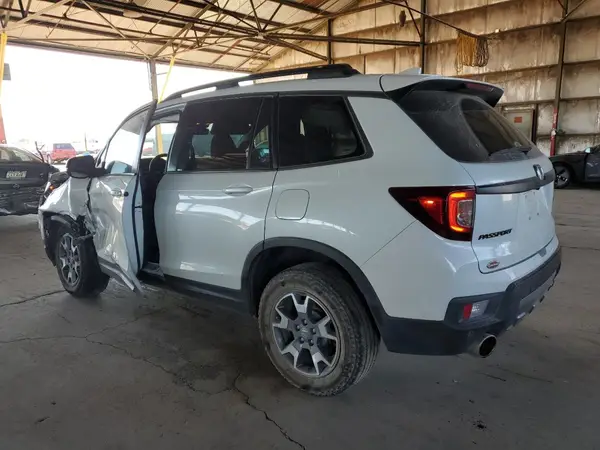 5FNYF8H68PB000476 2023 HONDA PASSPORT - Image 2