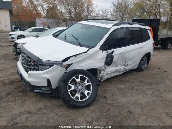 5FNYF8H69PB502980 2023 HONDA PASSPORT - Image 2
