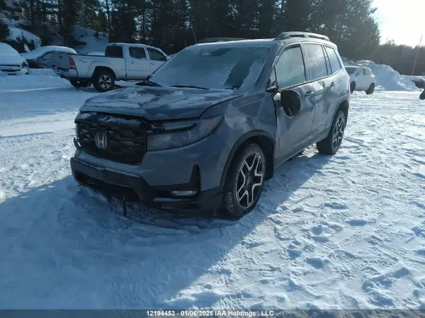 5FNYF8H95PB502307 2023 HONDA PASSPORT - Image 2
