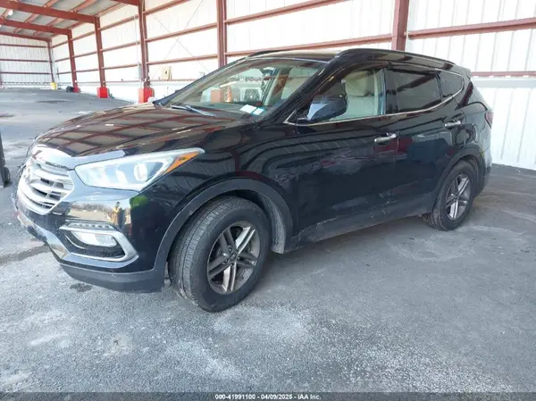 5NMZUDLB4HH031957 2017 HYUNDAI SANTA FE - Image 2