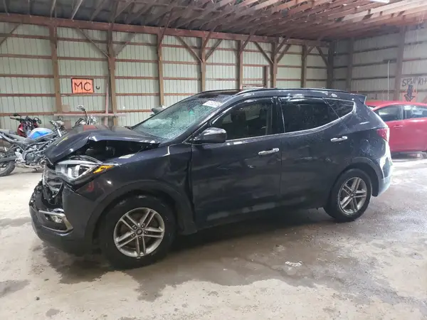 5NMZUDLB7JH056700 2018 HYUNDAI SANTA FE - Image 1