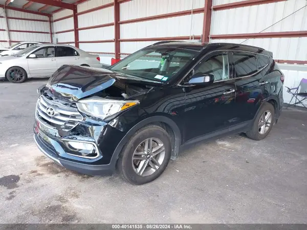 5NMZUDLB9HH031727 2017 HYUNDAI SANTA FE - Image 2