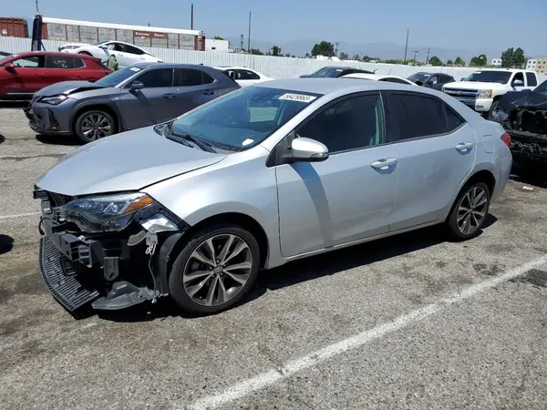 5YFBURHE5JP772390 2018 TOYOTA COROLLA - Image 1