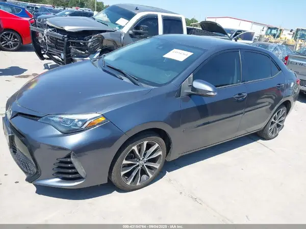5YFBURHE9JP772912 2018 TOYOTA COROLLA - Image 2