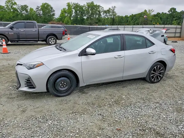 5YFBURHE9JP804869 2018 TOYOTA COROLLA - Image 1