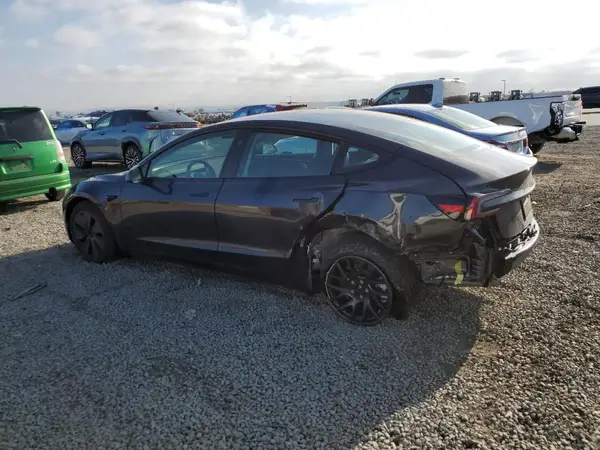 5YJ3E1EA6SF874864 2025 TESLA MODEL 3 - Image 2