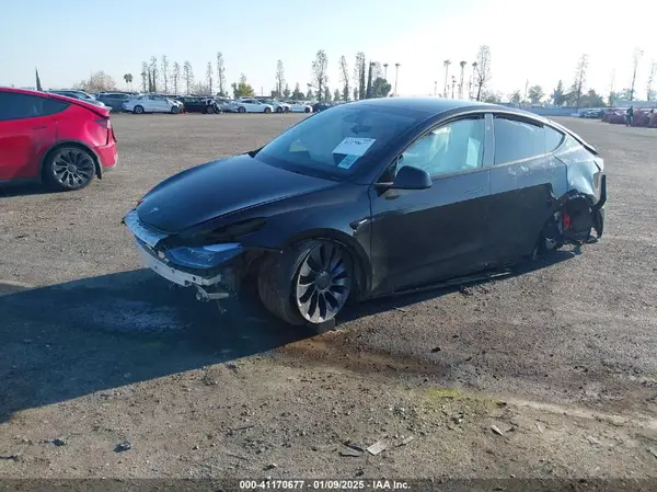 7SAYGDEF9SF218920 2025 TESLA MODEL Y - Image 2