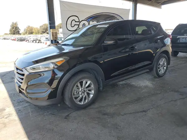 KM8J23A40GU233487 2016 HYUNDAI TUCSON - Image 1