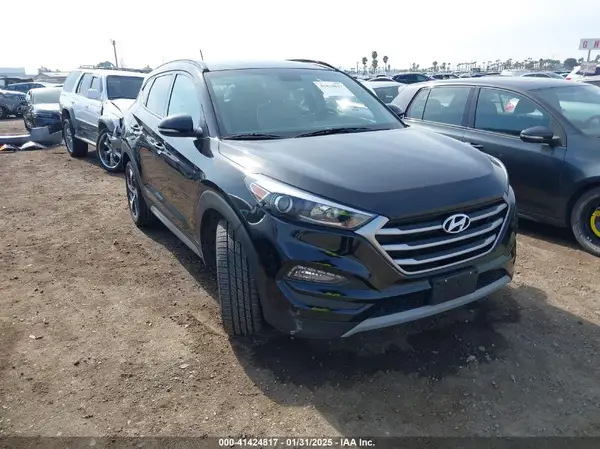 KM8J33A21HU582557 2017 HYUNDAI TUCSON - Image 1