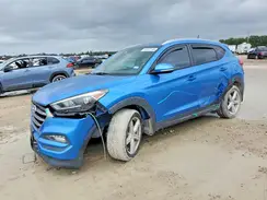 KM8J33A24GU231009 2016 HYUNDAI TUCSON