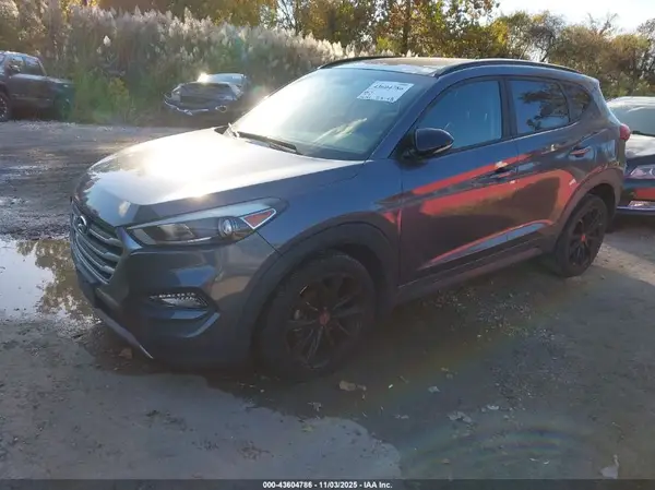 KM8J33A24HU487720 2017 HYUNDAI TUCSON - Image 2