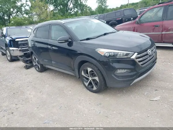 KM8J33A29HU310855 2017 HYUNDAI TUCSON - Image 1