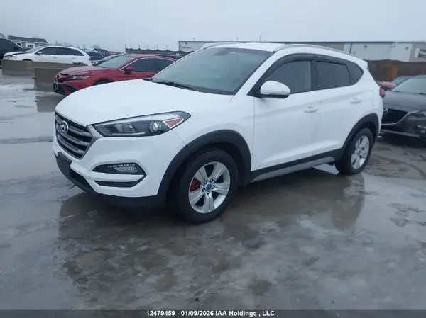 KM8J33A40HU560163 2017 HYUNDAI TUCSON - Image 2