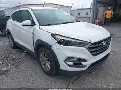 KM8J33A42GU061590 2016 HYUNDAI TUCSON