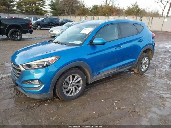 KM8J33A43GU125944 2016 HYUNDAI TUCSON - Image 2
