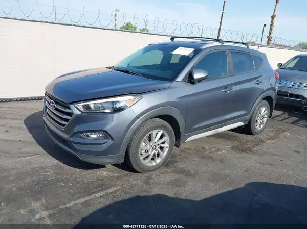 KM8J33A43HU562506 2017 HYUNDAI TUCSON - Image 2
