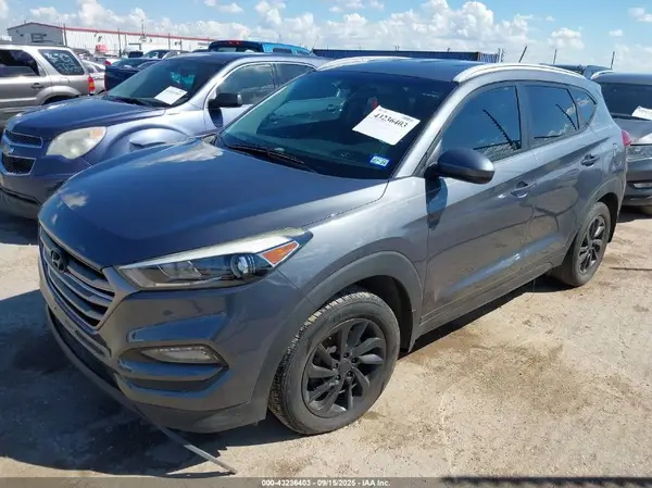KM8J33A44GU099306 2016 HYUNDAI TUCSON - Image 2