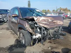 KM8J33A44GU115326 2016 HYUNDAI TUCSON