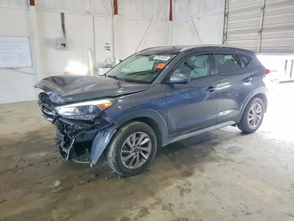 KM8J33A44HU594185 2017 HYUNDAI TUCSON - Image 1