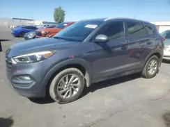 KM8J33A48GU099048 2016 HYUNDAI TUCSON