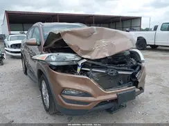 KM8J33A49GU188899 2016 HYUNDAI TUCSON